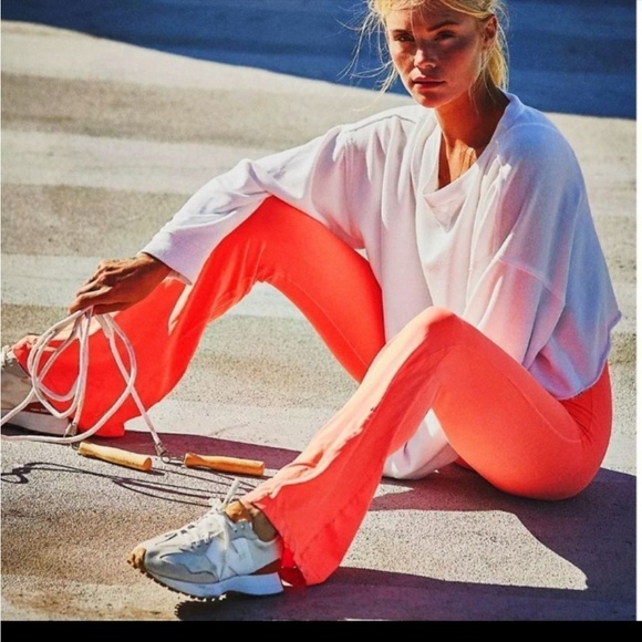 NWOT Free People Good Karma Flare Leggings. Neon Coral Size...